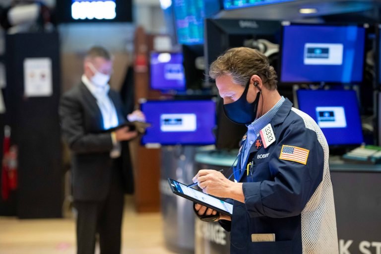 Stock futures slip as Wall Street kicks off the new year